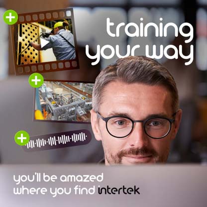 A man referencing multiple training materials