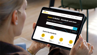 Woman interacting with Inform mobile app on tablet